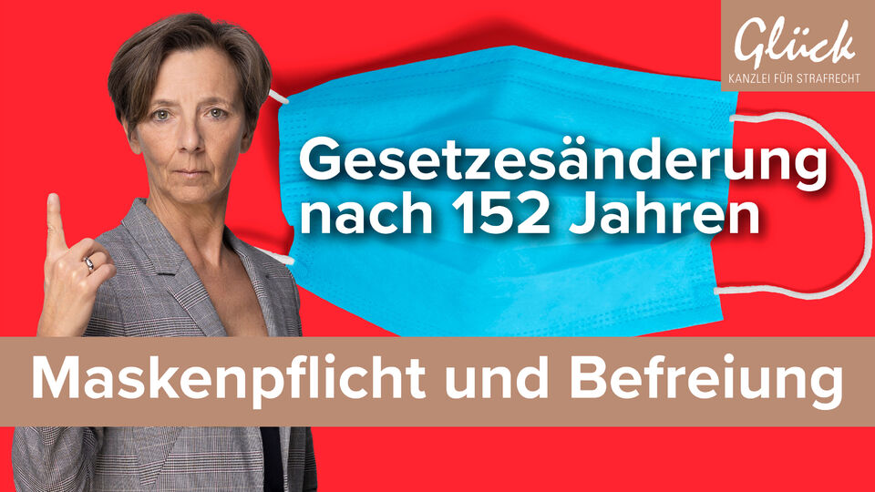 Maskenpflicht symbolisiert durch medizinische Maske auf rotem Hintergrund