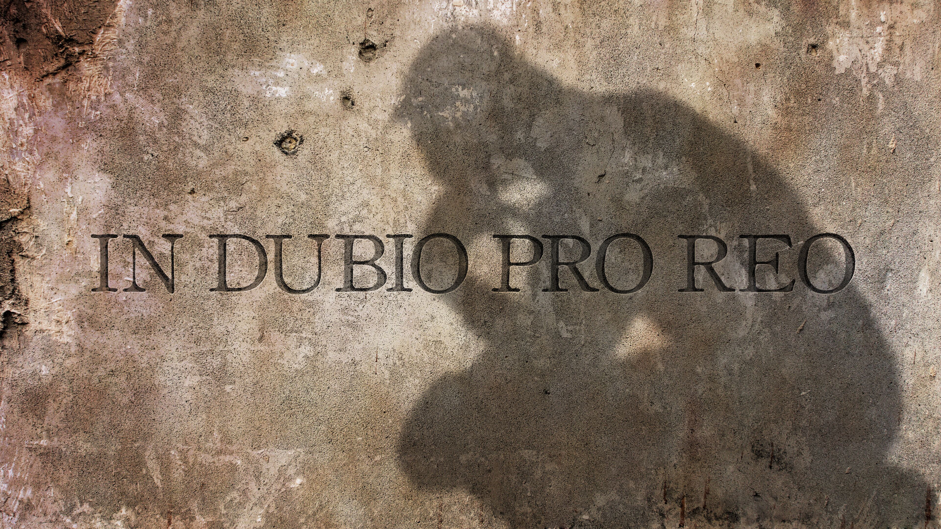 Unschuldsvermutung im Strafrecht: in dubio pro reo, lateinische Inschrift